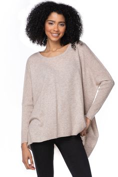 Crafted from luxurious 100% featherweight cashmere, this top-selling favorite has been a customer go-to for over a decade. With its relaxed, easy fit and ribbed details at the neck, cuffs, and hem, it offers timeless style and comfort. The side slits add effortless movement, making it perfect for layering or wearing on its own. A true wardrobe staple, this sweater continues to be a bestseller year after year. Subtle Luxury 100% California Cashmere Easy Fit Hand Wash Cold or Dry Clean Imported Winter Wrap, Subtle Luxury, Sweater Scarf, Luxury Scarves, Scarf Sale, Shirt Embroidery, St Barth, Poncho Sweater, Wrap Cardigan