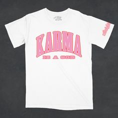 Show your love for Taylor Swift in this Midnights inspired oversized band tshirt!- Features the phrase "karma is a god" in a varsity style across the front & the word "midnights" on the sleeve- Screen print transfer that is heat pressed onto each tshirt- Tshirt is a super soft vintage wash that gets softer after each wash- Oversized fit- Sizing translation: XS/S = L , S/M = XL , L/XL = 2XL , 2XL/3XL = 3XL , 4XL/5XL = 4XL- Size up if you want a tshirt dress fit- 100% Cotton**due to screens & filt Pink Hip Hop Style Cotton T-shirt, Hip Hop Style Pink T-shirt With Screen Print, Pink Relaxed Fit Band Merch T-shirt, Screen Print Transfer, Varsity Style, Print Transfer, A God, Oversized Tshirt, Heat Press