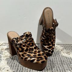 Gianni Bini Animal Print Platform Mules Size 6.5 Brand New, Never Worn Gianni Bini Sotelo Buckle Detail In Leopard Print Calf Hair Mules Slip-On Style Closed Toe Leather Upper Man Made Sole 5” Heel Height 1.5” Platform Offers Welcome Bundle To Save Have A Great Day!! Platform Mules, Gianni Bini, Calf Hair, Mule Clogs, Mules Shoes, Animal Print, Heel Height, Leather Upper, Slip On