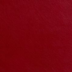 a red leather textured background or wallpaper that looks like it has been painted