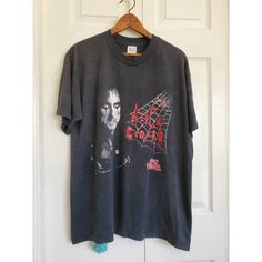 Introducing the extraordinary Rare Vintage Alice Cooper Tour Shirt, a true gem for all rock enthusiasts and collectors alike. This Romy And Michelle, Spooky Spider Web, 80s Crop Top, Alice Cooper, Concert Tees, Friends Fashion, Floral Crop Tops, Tour Shirt, Revolve Clothing