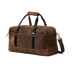 Everyday Satchel Travel Bag In Textured Leather, Functional Brown Tote Weekender Bag, Classic Textured Leather Duffle Bag For Everyday, Classic Textured Leather Duffle Bag, Functional Brown Bag With Leather Backing, Textured Leather Satchel Duffle Bag For Everyday Use, Leather Duffle Bag With Luggage Sleeve For Weekend Trips, Everyday Textured Leather Satchel Duffle Bag, Luxury Leather Travel Bag With Waxed Finish