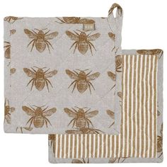 two place mats with bees on them, one in brown and the other in white