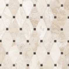 a white and brown tile wall with hexagonal shapes