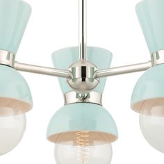 three light chandelier with blue glass shades on the top and bottom, hanging from a ceiling fixture