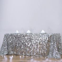 a table with silver sequins on it