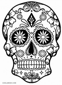 a black and white sugar skull with flowers