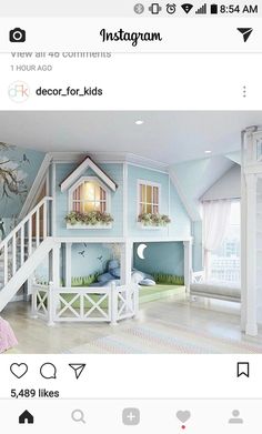 a child's bedroom with blue walls and white furniture, including a loft bed