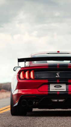 the rear end of a red sports car