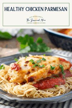 chicken parmesan on a plate with spaghetti and sauce in the foreground text reads healthy chicken parmesan