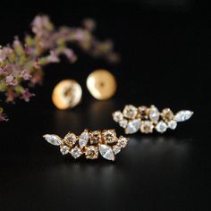 "An exclusive piece from our shop, these earrings are absolutely to die for..! Special Earrings for your special day. A bunch of beautiful natural white, light brown and dark brown diamonds, hand picked and arranged in a grand symphony! Your heart will surely skip a beat.. Ours did.. :) * Gemstone : Natural White & Champagne Diamonds (Untreated) * Total Diamond Wt. : 0.86 Ct * Clarity Grade : Vs-Si * Gold - 14k, 2.5gm ROSE gold (approx.) If you like this earring, please press \"Pin it\" butt Diamond Ear Climbers For Wedding Fine Jewelry, Yellow Gold Diamond Ear Climbers For Wedding, Diamond Ear Climbers For Wedding, Yellow Gold Wedding Ear Cuff, Gold Diamond Ear Climbers For Wedding, Gold Fine Jewelry Ear Climbers For Wedding, Rose Gold Ear Cuff For Wedding, Special Earrings, Cluster Earring