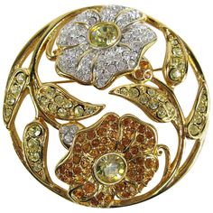 Stunning circle Swarovski Floral Brooch Amber and clear Crystal flowers. Measuring 1.90 in / 48.84 mm. This Comes in original Box. This is out of a massive collection of Hopi, Zuni, Navajo, Southwestern, sterling silver, costume jewelry and fine jewelry from one collector. Be sure to check our store front for more fabulous pieces from this collection. We have been selling this collection on 1st dibs since 2013. You can Follow us via storefront as well! To find out how please contact me and I'll Gold Bracelets Stacked, Floral Circle, Crystal Flowers, Yellow Jewelry, Floral Brooch, Jewelry Model, Old Jewelry, Fantasy Jewelry, Vintage Jewels