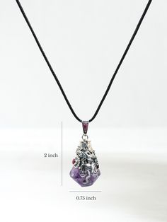 Magnificantly hand-crafted chunky pendant with intricate alpaca silver details encasing semi-precious Peruvian amethyst. This pendant features three archetypes of Incan cosmology: Sachamama, the serpent of the South; Jaguar, or Otorongo of the West; and the condor-eagle, Apuchin, of the East. Silver spiral swirls with draping strands of silver encasing the central stone. The small inset is purple spondylus as is the inset in the bail. Approximately 2 inches long including the bail and .75 inches Purple Spiritual Necklace With Large Pendant, Spiritual Purple Necklace With Large Pendant, Spiritual Amethyst Pendant Necklace, Spiritual Purple Jewelry With Large Pendant, Amethyst Necklace With Large Pendant For Healing, Amethyst Gemstone Amulet Necklace, Mystical Silver Amethyst Necklaces, Mystical Silver Amethyst Crystal Necklace, Spiritual Amethyst Pendant Jewelry