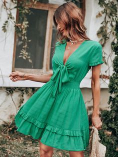 Spring Summer Women Green V Neck Low Cut Bow Short Sleeve High Waist Swing Short Dress For Fashion Description Origin:CN(Origin)Sleeve Style:RegularSilhouette:A-LINENeckline:V-NeckStyle:CasualDresses Length:Knee-LengthMaterial:PolyesterMaterial:ViscoseAge:Ages 18-35 Years OldSeason:SummerClosure Type:PulloverType:RegularRelease Date:Summer 2022Fabric Type:ViscoseMaterial Composition:Synthetic fiberWaistline:empirePattern Type:SolidSleeve Length(cm):ShortPlace Of Origin:China (Mainland)Gender:WOMEN  Body Size Size S= RUS Size 42 = EU Size 34 = UK Size 8 = AU Size 8 = US Size 4Recommendation>>Bust: 86-90 cm, Waist: 66-69 cm, Hips: 90-94 cmSize M = RUS Size 44 = EU Size 36 = UK Size 10 = AU Size 10 = US Size 6Recommendation>>Bust: 90-94 cm, Waist: 70-73 cm, Hips: 94-98 cmSize L = RUS Size 46 Bright Green Dress, Bright Boho, Bow Shorts, Boho Summer Dresses, Green Mini Dress, Plaid Bow, Ruffle Hem Dress, Boho Summer, Plaid Dress