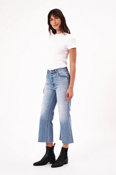 DescriptionThe Classic Cropped Flare Chloe Denim Jeans feature: High rise, relaxed fit with crop flare hem Features our signature back pocket stitching Specially angled and shaped in the back for a truly flattering fit Made with Rolla's signature gold-toned trims Button fly Raw hems Fabric100% Cotton Sizing Rise: 28 cm / 11 inchInleg: 68 cm / 26.8 inchHem: 51cm / 20 inch *Measurements for size 26/8The model wears a size 26/8 in bottoms. About Rolla's JeansRolla's was inspired by Australian vinta Rollas Jeans, Pocket Stitching, Crop Flare, Kids Accessories Jewelry, Cropped Flares, Relaxed Fit Jeans, Cleanser And Toner, Mens Outerwear, Jeans Fit