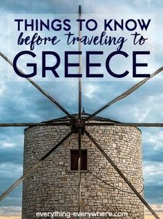 a windmill with the words things to know before traveling to greece on it's side