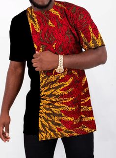 Inspired by traditional African attire, The Black Udo Men’s African Print Traditional Dress Shirt with the contrast Ankara fabrics makes for the perfect culturally confident look. Pair the shirt with dress pants or blue jeans to achieve a day to night look. Ankara Shirts For Men, Traditional African Attire, Ankara Fabric, African Wear, Traditional Dress, African Attire, African Fashion Dresses, Night Looks, African Dress