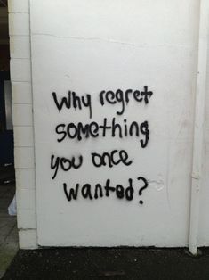 graffiti on the side of a building that says, why roger something you once wanted?