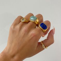 Statement Gemstone Ring - This beautiful and bold 18k gold agate ring makes for a perfect statement piece to add to your jewelry collection. Its thick and chunky design makes for an eye-catching accessory that is sure to turn heads. Details: stainless steel and gold gold filled blue or green agate stone hypoallergenic minimalist Chunky Colourful Rings, Rings With Stones Gemstones, Chunky Rings Aesthetic, Gold Chunky Rings, Big Stone Rings, Jewelry Goals, Chunky Jewellery, Spiral Jewelry, Gold Gallery