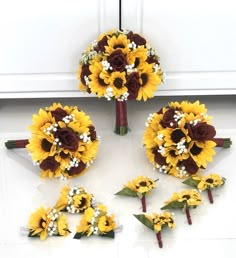 a bouquet of sunflowers and other flowers are arranged in the shape of letters