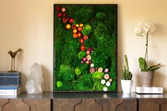 a painting on a wall with flowers and plants