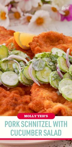 a plate with cucumber salad on it and the words pork schnitzel with cucumber salad