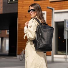 Incredibly spacious and practical — for times when a smaller backpack just doesn't cut it, our Prime women's premium leather backpack is the one to choose. The Prime is handmade in Italy from premium full-grain vegetable-tanned cow leather. The interior is lined with high-quality canvas and we included three separate compartments inside on top of the main compartment where you can keep your essentials nicely organized. Furthermore, there's another large zipped pocket on the front of the bag givi Leather Backpack For On-the-go, Luxury Soft Leather Everyday Backpack, Modern Leather Backpack For On-the-go, Modern Business Backpack With Leather Handles, Soft Leather Backpack For Commuting, Modern Soft Leather Backpack For On-the-go, Modern Soft Leather Everyday Backpack, Leather Standard Backpack For Commuting, Rectangular Soft Leather Backpack For Commuting