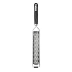 a grater with a black handle on a white background