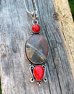 "Gorgeous, one-of-a-kind, big and long, multi gemstone pendant necklace: natural raw/rough Jasper, and red coral, set in 925 sterling silver plated over copper. 16\" inches long 925 solid sterling silver snake chain. Pendant size: 3\" x 1\" inches, approximately." Red Natural Stones Jewelry For Healing, Silver Jasper Necklace With Natural Stones, Unique Red Jewelry With Large Stone, Unique Red Stone Necklaces, Red Jasper Spiritual Necklace, Bohemian Silver Necklace With Raw Stone, Artisan Red Jewelry With Large Pendant, Red Agate Stone Necklace, Red Jasper Jewelry With Natural Stones