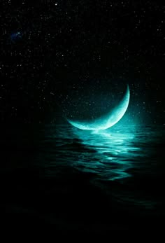 the moon is shining brightly in the dark night sky over the water and stars above it