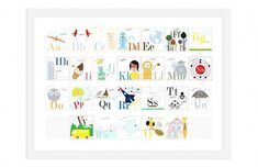 a white framed print with various children's alphabets and animals on it, all in different colors