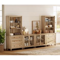 a living room scene with focus on the cabinet and shelf units that have glass doors