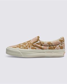 Slip-On Reissue 98 Groovy Floral Shoe Vans Sneakers With Textured Sole For Spring, Vintage Vans Slip-on Sneakers, Vans Textile Sneakers For Spring, Vans Slip-on Sneakers For Spring, Pink Slip-on Sneakers With Closed Toe, Vans Slip-on Sneakers With Round Toe For Spring, Globe Logo, Vans Store, Quilt Jacket