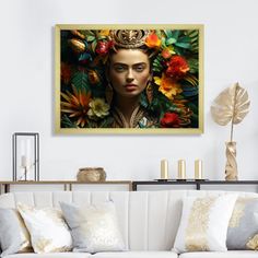 a living room with a white couch and painting on the wall above it that has an image of a woman's face surrounded by flowers