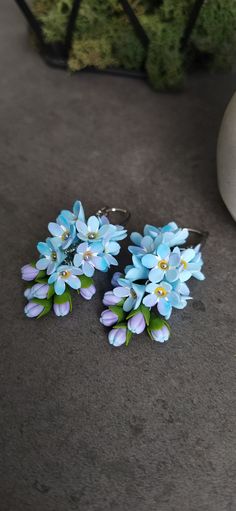 Blue Flower Earrings For Pierced Ears, Blue Handmade Flower Earrings, Handmade Blue Flower Earrings, Blue Flower-shaped Earrings With Ear Wire, Blue Drop Flower Earrings, Light Blue Flower-shaped Jewelry With Matching Earrings, Blue Drop Flower Earrings With Ear Wire, Handmade Light Blue Drop Flower Earrings, Blue Flower-shaped Earrings For Gifts