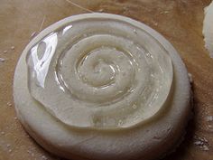 a close up of a doughnut on a cutting board