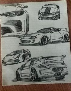 some cars are shown in this drawing on paper