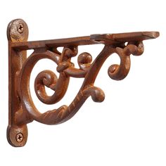 an ornate wooden shelf bracket on a white background