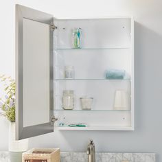 While its rich brushed nickel frame is the first thing you'll likely notice on this steel-bodied medicine cabinet, when you look closer you'll see plenty of other premium features, too. The bathroom cabinet has a powder-coated steel body, soft-close Euro-style hinges and three adjustable-height shelves. For installation convenience, the mirror medicine cabinet can be surface or recess mounted with side panels included for the surface mount option. It's ideal for installation on a wall over any 2 Vanity Update, Bathroom Medicine Cabinet Mirror, Mirror Medicine Cabinet, Surface Mount Medicine Cabinet, Mirrored Door, Recessed Medicine Cabinet, Bathroom Layouts, Medicine Cabinets, Medicine Cabinet Mirror