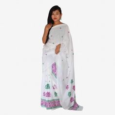 Assamese Traditional Mekhela Chador__   Bua Pokua Xuta Gossmiri Mekhela Chador set is a made from the most adorable threads Pokua Xuta of Assam and the beautiful Green and Purplle flowers on it. As beautiful the cloth is its more comfortable for summers too_____Rs. 2,119.00 The Cloth, Pajama Pants, Flowers, Pants, Green