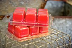 four wax cubes sitting on top of a wire rack