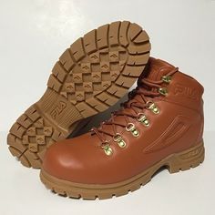 For sale is a new (no box) pair of FILA Diviner Light Brown Men's Hiking/Work Boots in Size 9.5. Condition: New without Box. There is a small black mark on the inner-top material of the right boot that can be seen in photos 3, 5, and 6). Please see all of the pictures carefully for condition details. Brand: Fila Color: Light Brown / Tan Size: 9.5 Men's (Please see shoe tag photo for sizing details) Style #: 1HM00552-200 If you have any questions, please ask! Shoe Tags, Tag Photo, Danner Mountain Light Boot, Vintage Logo, Timberland Boots, Work Boots, Color Light, Light Brown, Hiking Boots