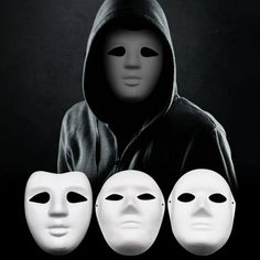 a person wearing a hooded jacket and three white masks in front of him with the hood up