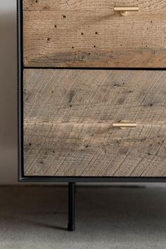 two drawers with metal handles and wood grains on each drawer, side by side