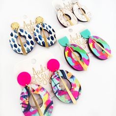 Make a statement this spring and summer with these neutral Bold Statement Earrings! Featuring vibrant colors and Audra's artwork, these medium-sized earrings are sure to catch attention. With a touch of brass charm, they're perfect for adding a pop of personality to any outfit. All findings and posts are nickel-free. Be ready to wear these with everything! These earrings are super lightweight and one-of-a-kind. Materials: wood, acrylic, brass Painted Mailboxes, Rainbow Springs, Painting Glassware, Wood Acrylic, Epoxy Resin Crafts, Link Earrings, Pink Spring, Statement Earring, Earrings Inspiration