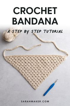 the crochet bandana pattern is shown with yarn, scissors and knitting needles