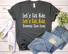 Let's Eat Kids Let's Eat, Kids - Commas Save Lives - Unisex T Shirt Long Sleeve T-Shirt Tees Tshirt Sweatshirt Sweater Hoodie Gift For Men Women Boys Girls Commas Save Lives | Back to School | Teaching Gifts | High School Teacher | Let's Eat Kids | Funny Grammar Tee | Punctuation Shirts | Middle School Teach | student teacher gift | grammar police | lets eat kids | punctuation meme | kids english teacher Well, let's say goodbye to all this boring apparel... The GodBlessThisDesign team creates cu Mama Shirts, Ride Or Die, Screen Printing Designs, Roller Derby, Nursing Shirts, Happy Campers, Mama Shirt, Teacher Shirts, Mom Shirts