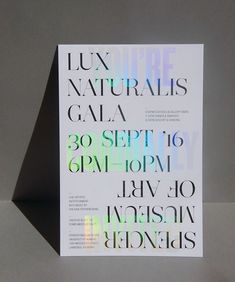 a card with the words lux natureis galaa written in multicolored letters