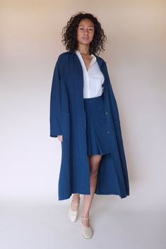 The Oversized Duster is a classic military inspired outerwear piece with a corozo button placket and oversized fit. Made in a crinkled Linen/Cotton, the Oversized Duster is the perfect throw on, final layer. Tie the belt around, or leave it open, roomy, and free. Linen Duster Outfit, Duster Outfit, Linen Duster, Long Sleeve Denim Dress, Duster Jacket, Military Inspired, Spring Summer Outfits, Librarian, Denim Top