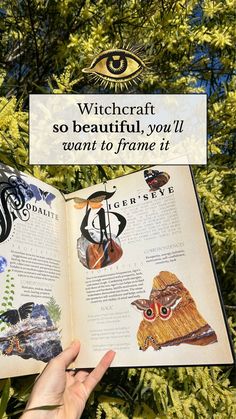 someone holding an open book in front of a tree with the words witchcraft so beautiful, you'll want to frame it